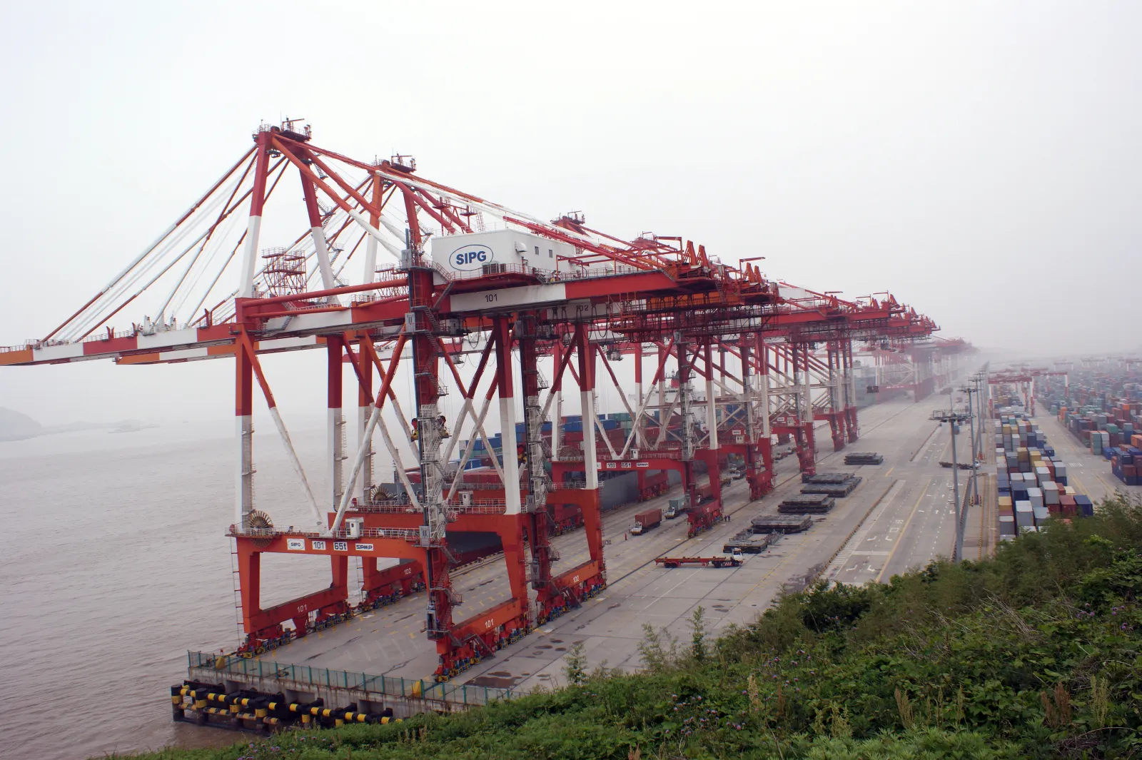 Containers at Shanghai Yangshan Port in a 2013 archival photograph; representative of trade, not the 2026 negotiations.